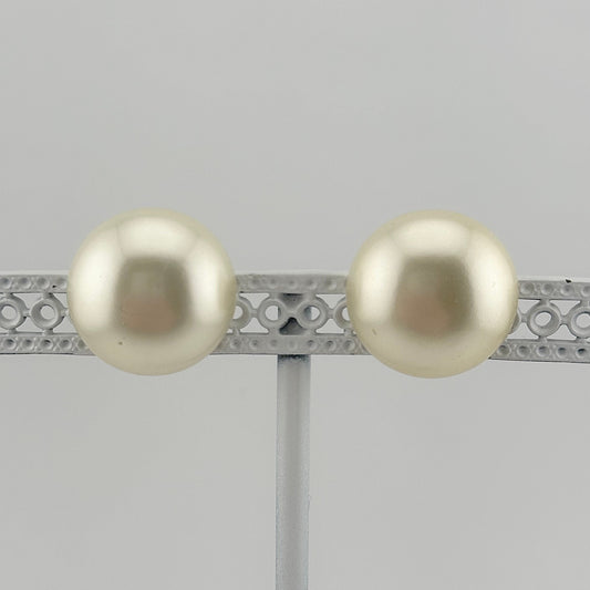 Vintage Clip-On Earrings, Iridescent White Plastic with Silver Back.